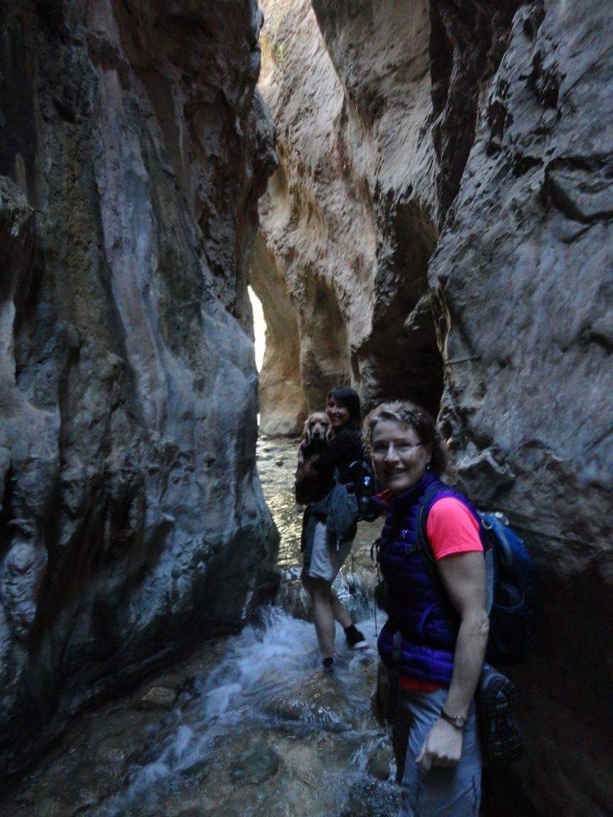 Wading through the Rio Chillar Gorge near Nerja Spain