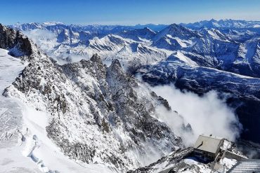 Snowy mountain views with the Torino Mountain Hut in sight from Skway Monte Bianco top station Punta Helbronner