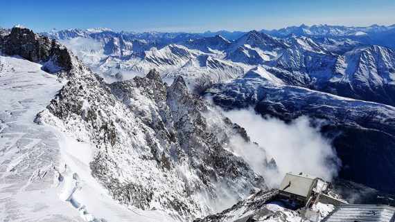 Snowy mountain views with the Torino Mountain Hut in sight from Skway Monte Bianco top station Punta Helbronner